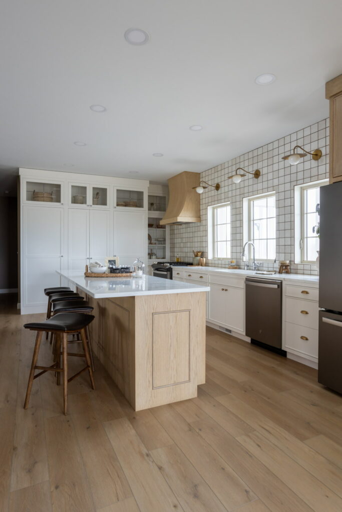 kitchen with an island and tile backsplash
